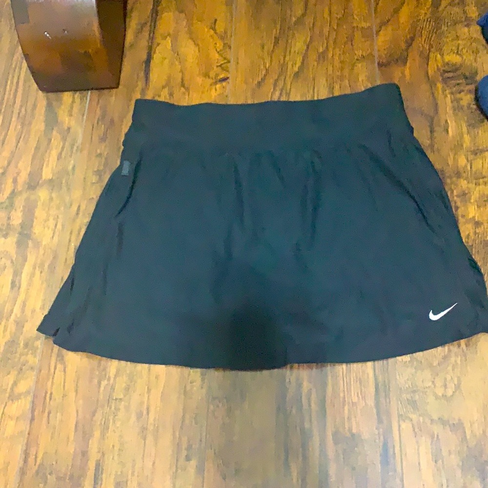 Nike Black tennis skirt with built in shorts.